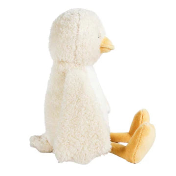 Plush toy penguin on a white background