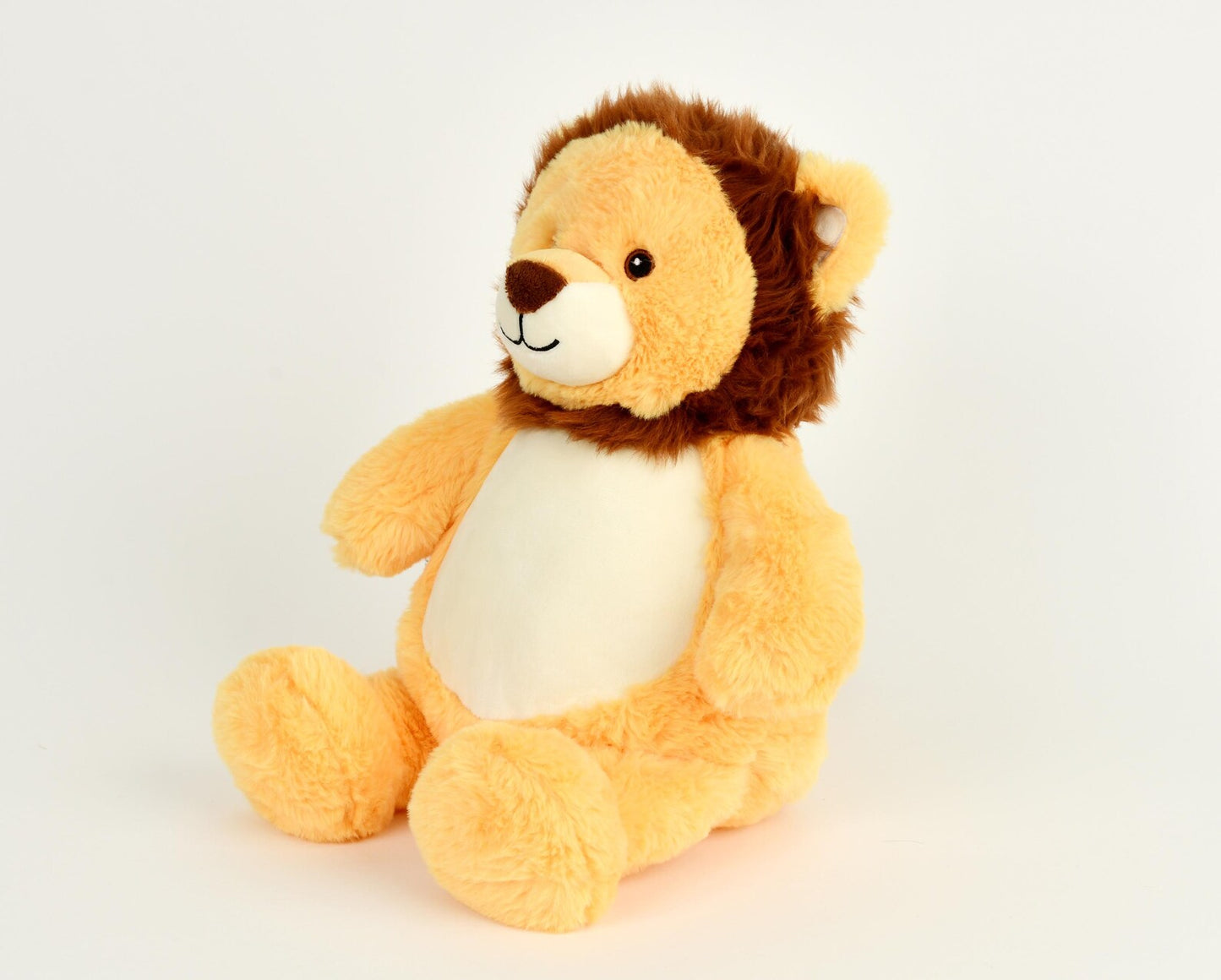 Plush toy lion on a light gray background