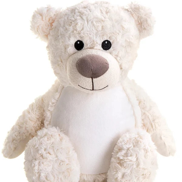 White teddy bear with a soft texture on a white background