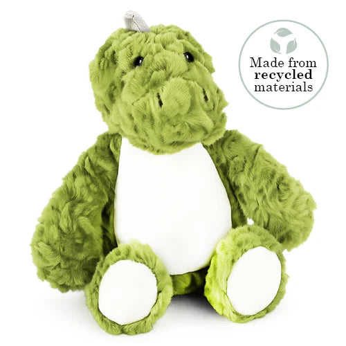 Green plush dinosaur toy with a white belly on a white background, featuring a label indicating recycled materials.