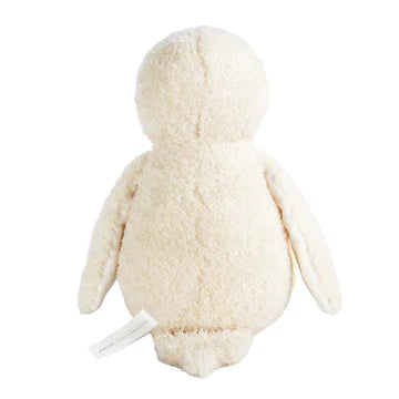 White plush toy with a tag on a white background