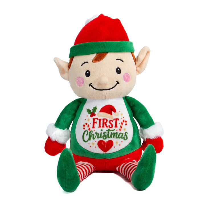 Plush toy elf with 'First Christmas' shirt on a white background