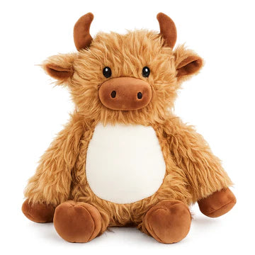 Plush toy cow with a white belly on a white background