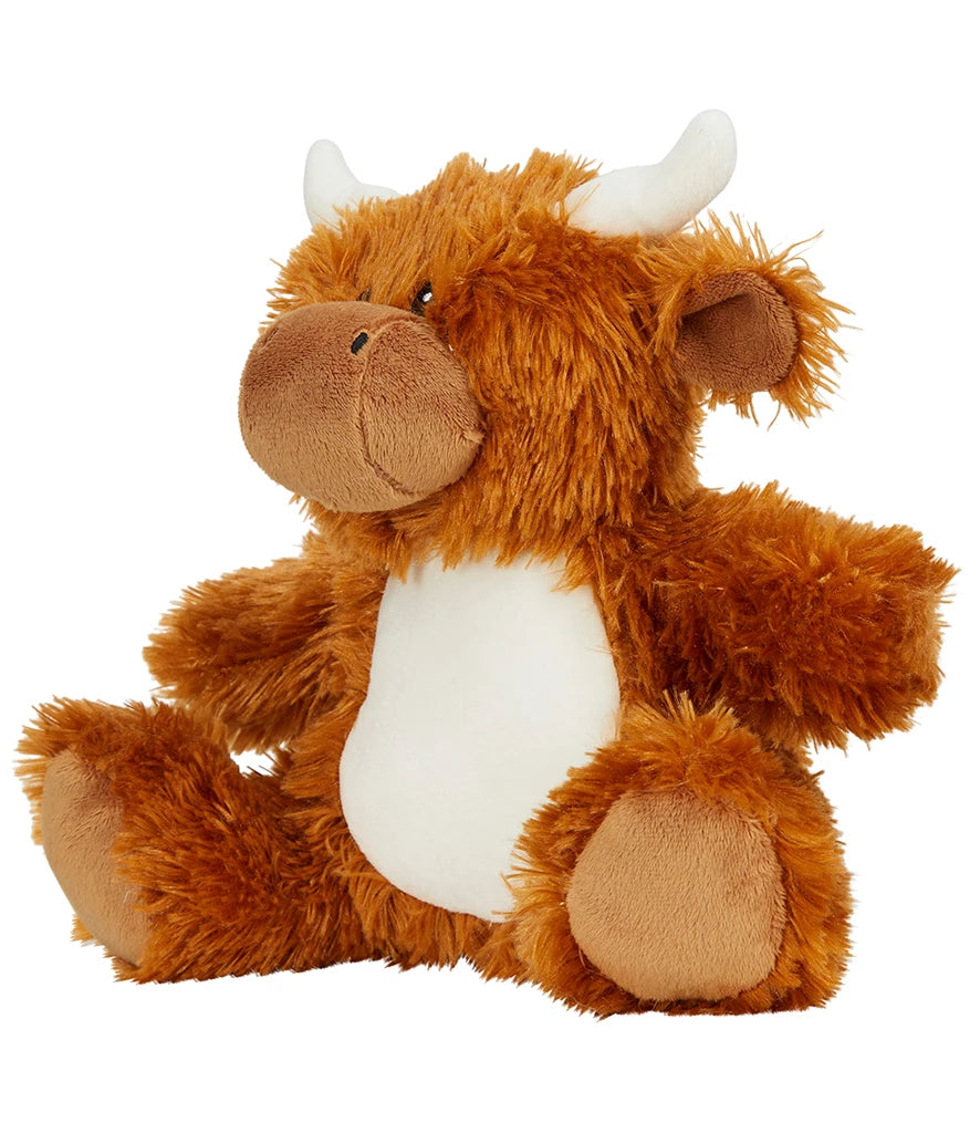 Plush toy cow with brown fur and white horns on a white background