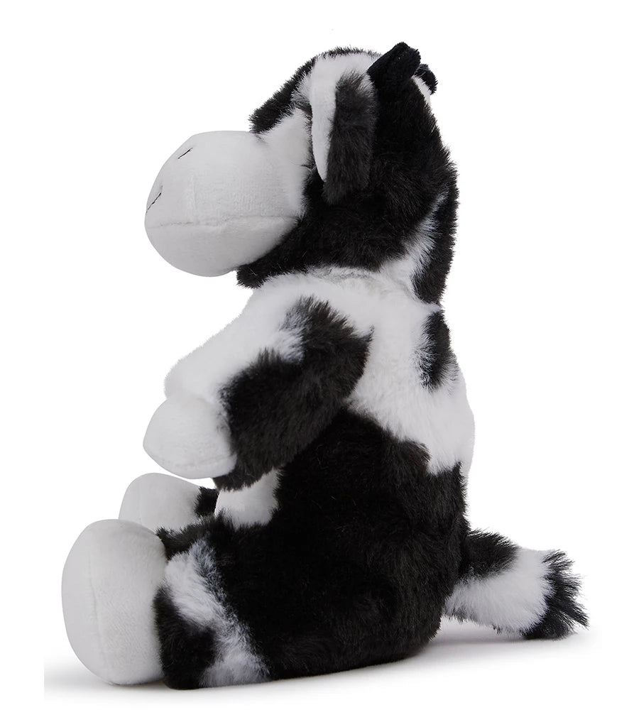 Plush toy cow with black and white pattern on a white background
