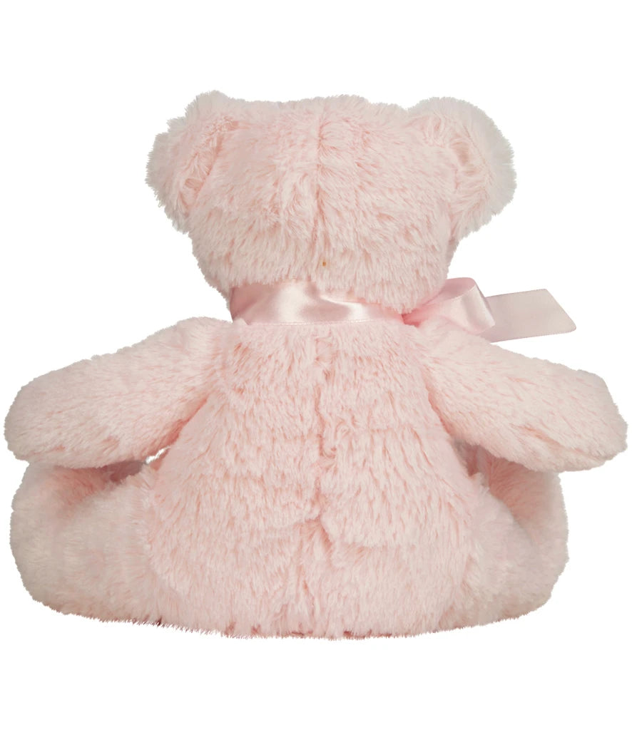 Pink teddy bear with a bow on a white background