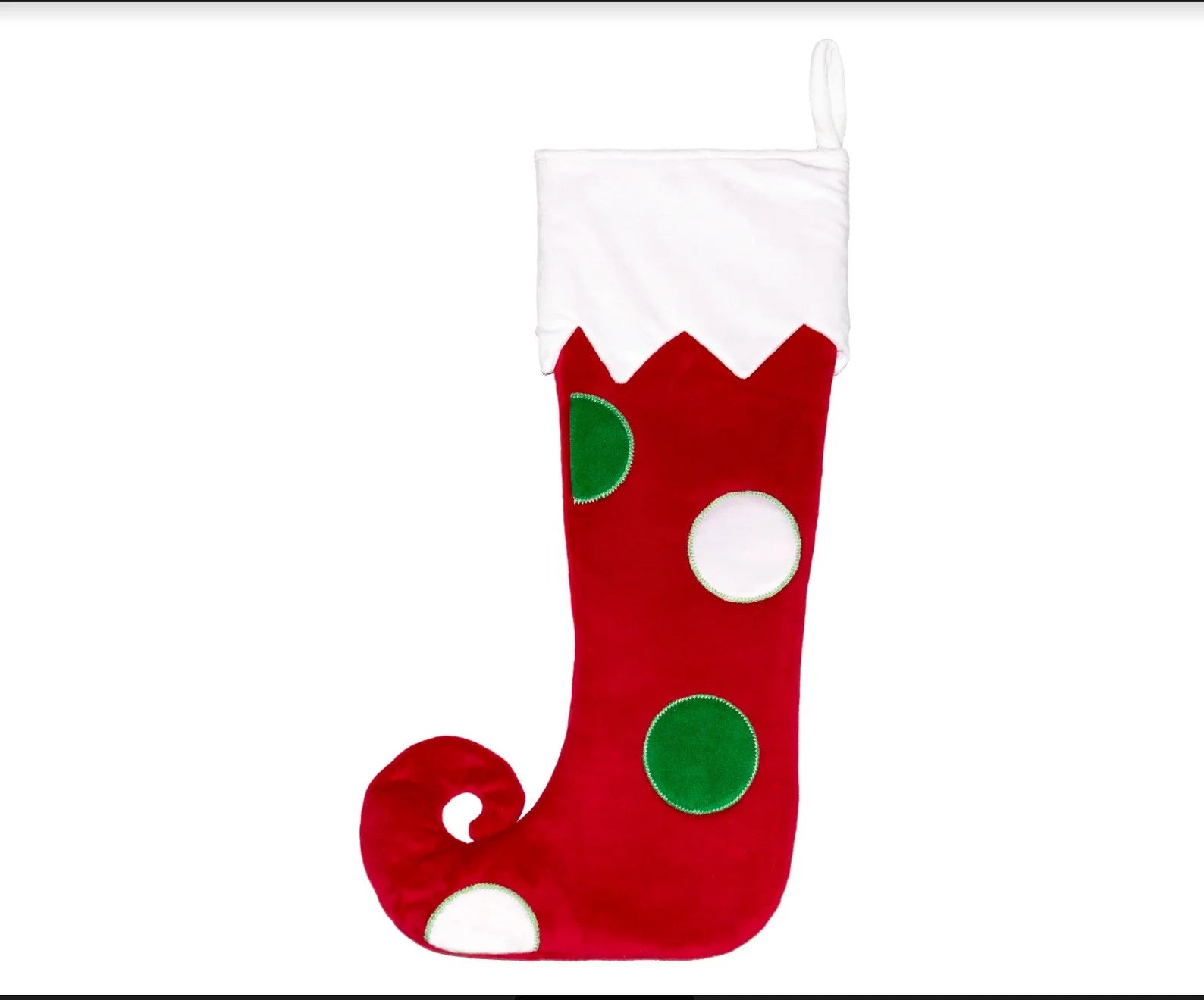 Red Christmas stocking with green polka dots on a white background