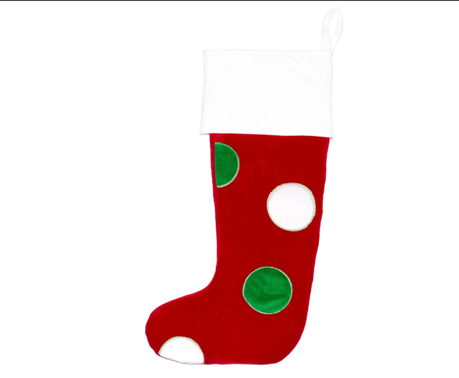Red Christmas stocking with green polka dots on a white background