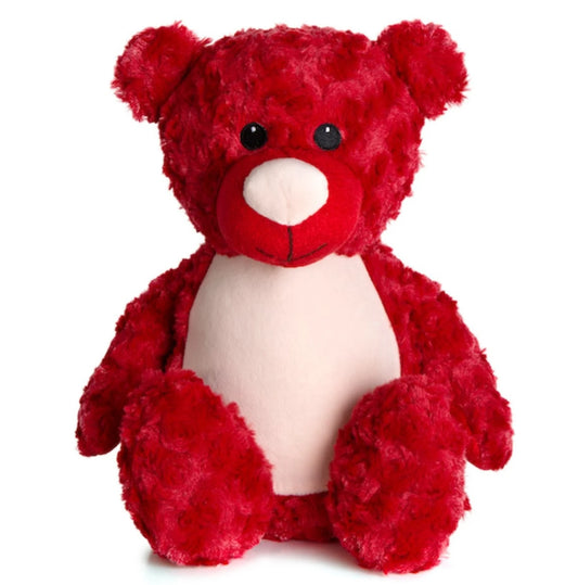 Red teddy bear on a white background