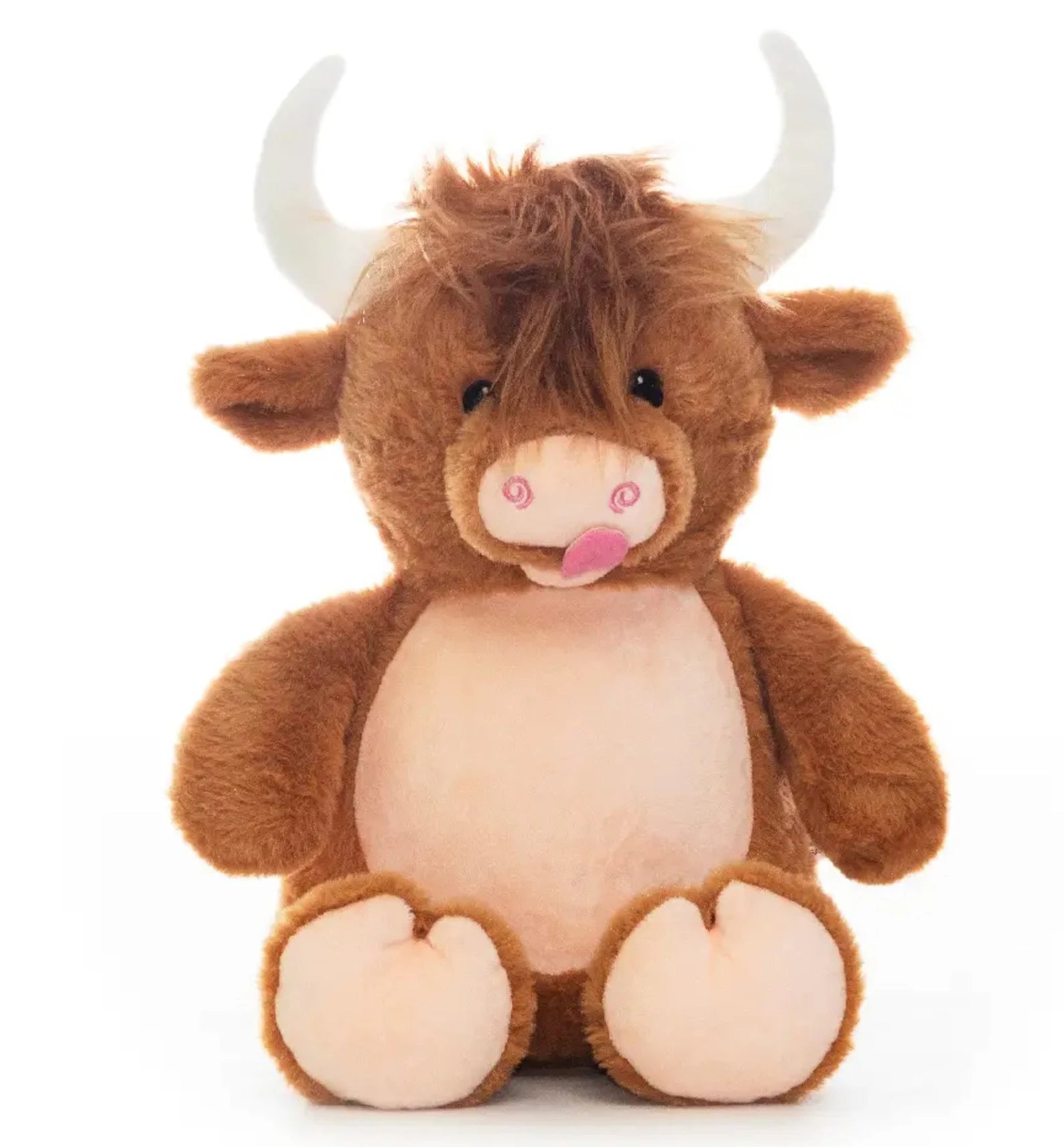 Plush toy highland cow on a white background