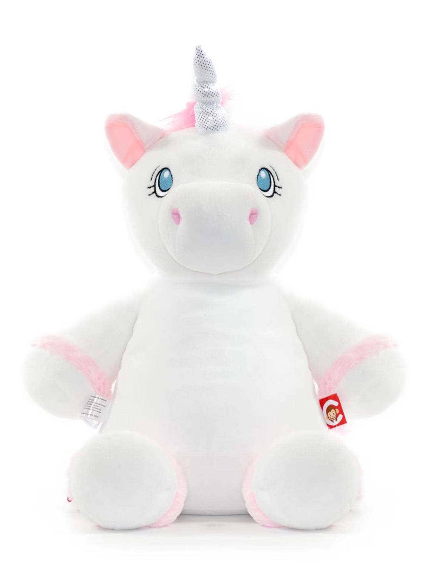 white soft toy unicorn