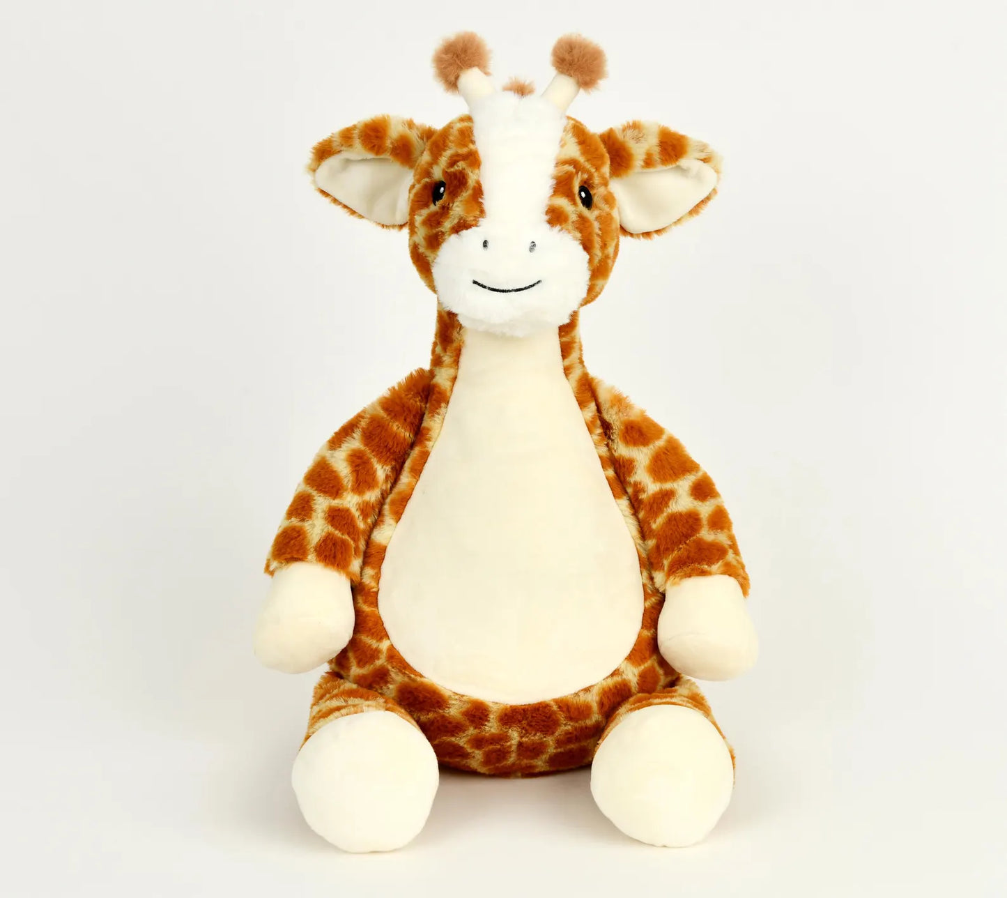 Plush giraffe toy on a white background
