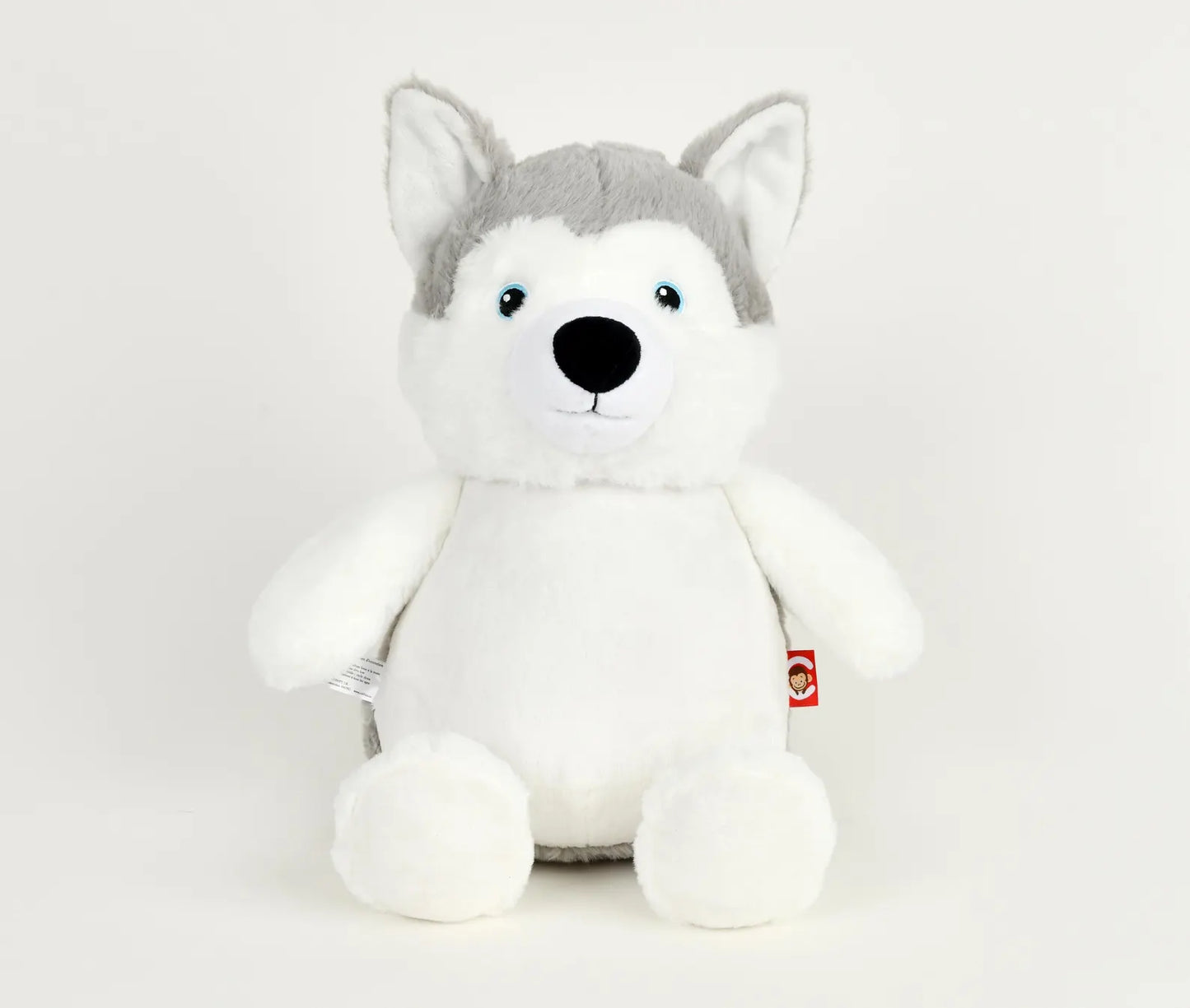Plush toy husky on a white background