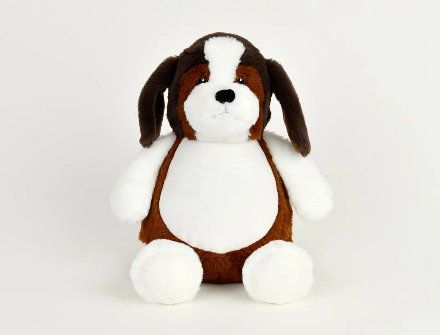Stuffed dog toy with brown and white color scheme on a light gray background