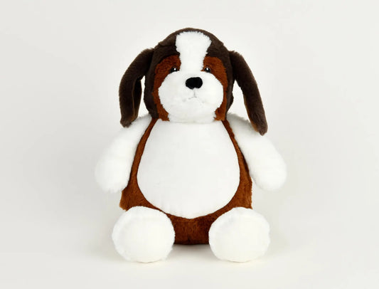 Stuffed dog toy with brown and white color scheme on a light gray background