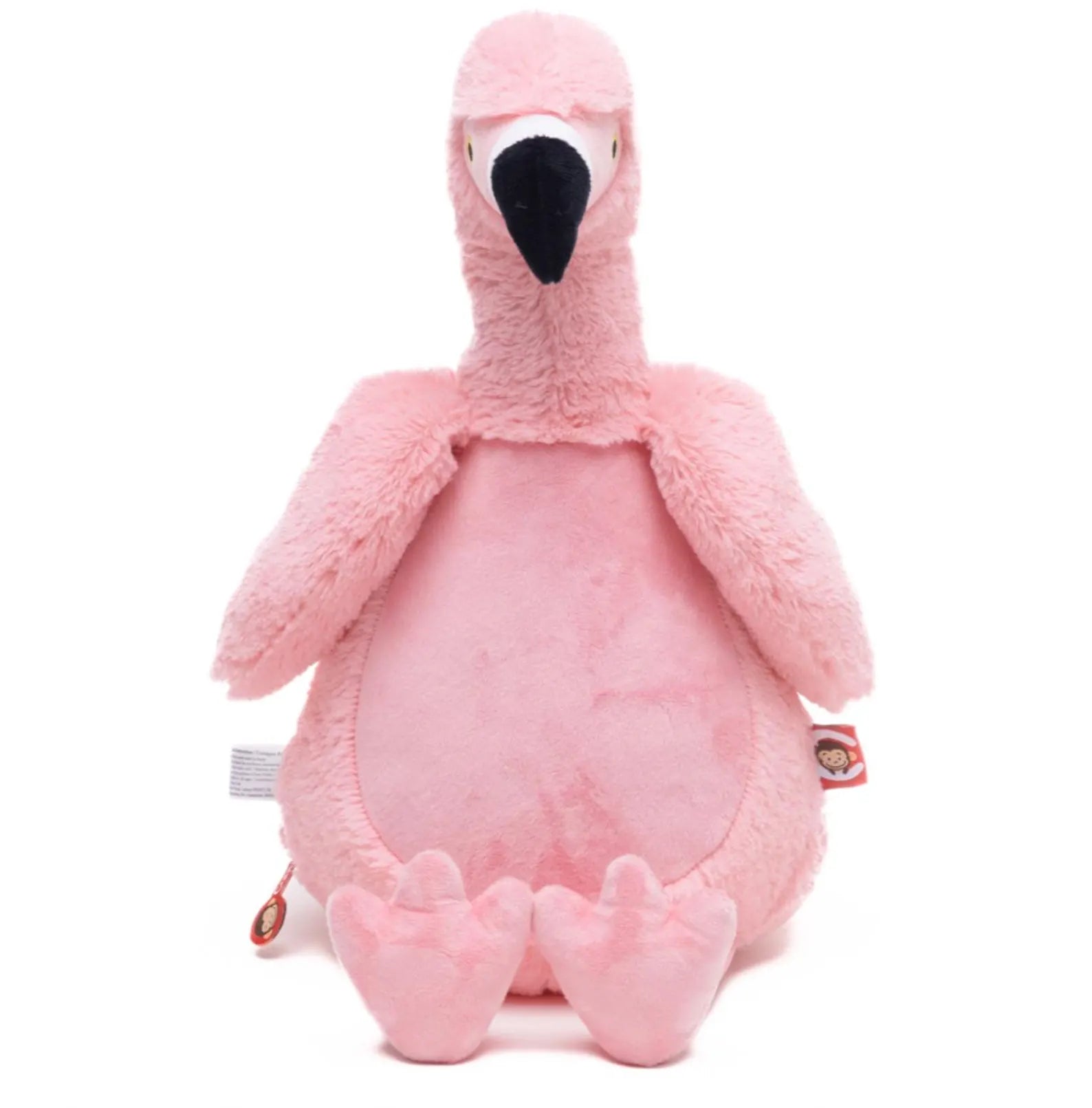 Pink plush flamingo toy on a white background