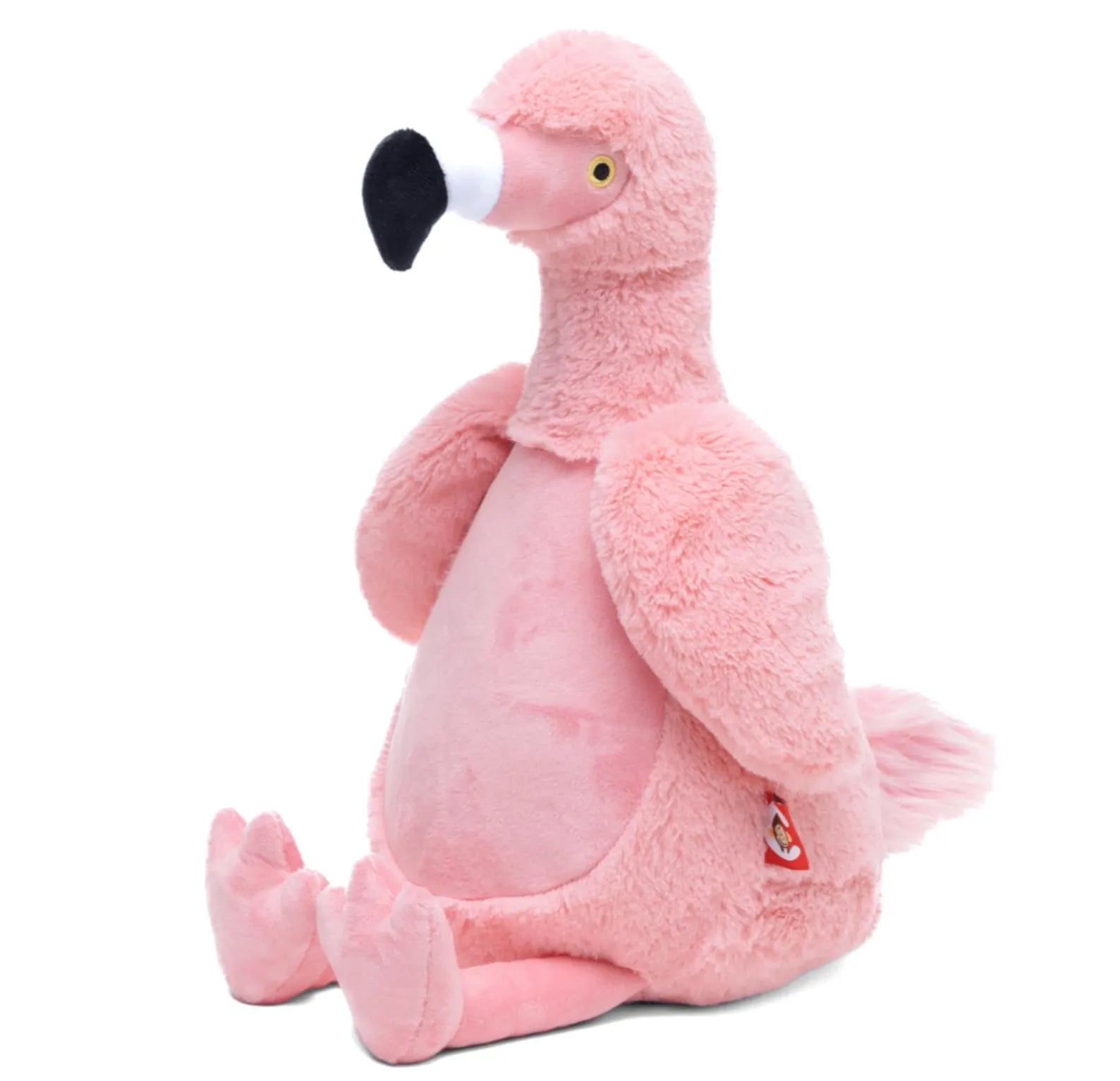 Pink plush flamingo toy on a white background