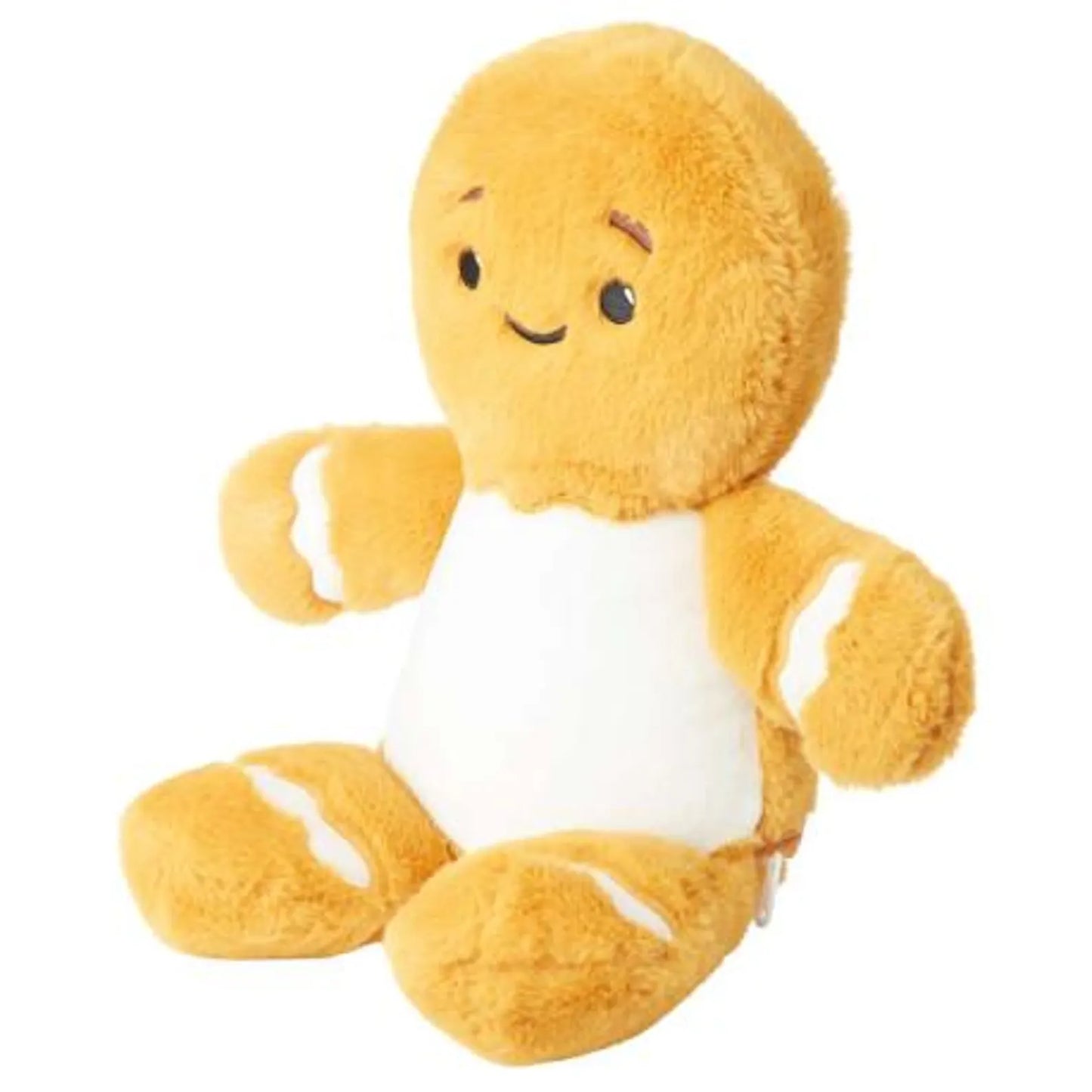 Plush gingerbread man toy with a round body, white belly, and yellow arms and legs on a white background