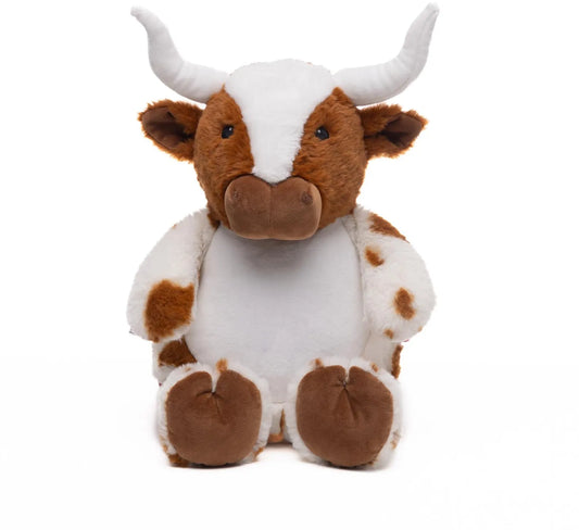 Plush toy cow with brown and white color pattern on a white background