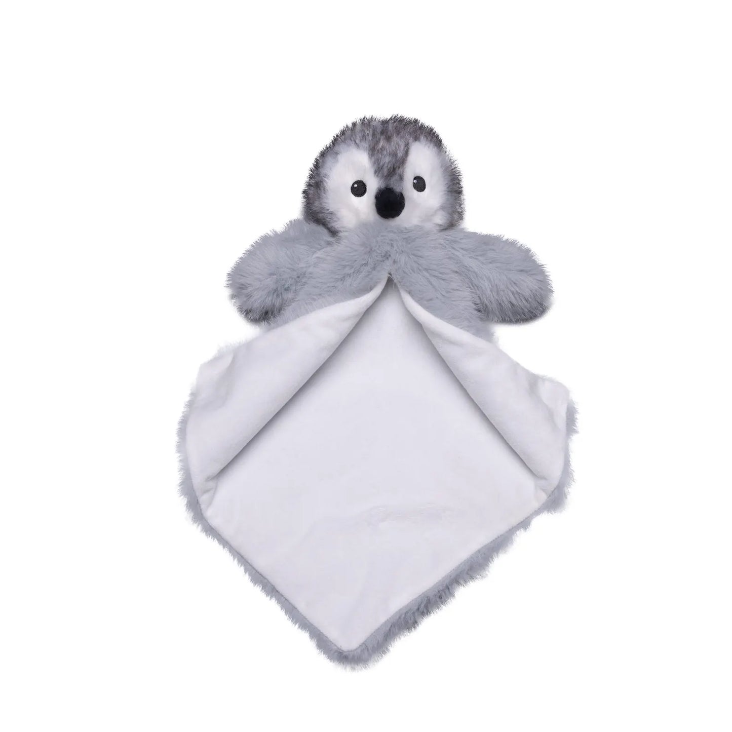 Plush penguin toy with a white blanket on a white background