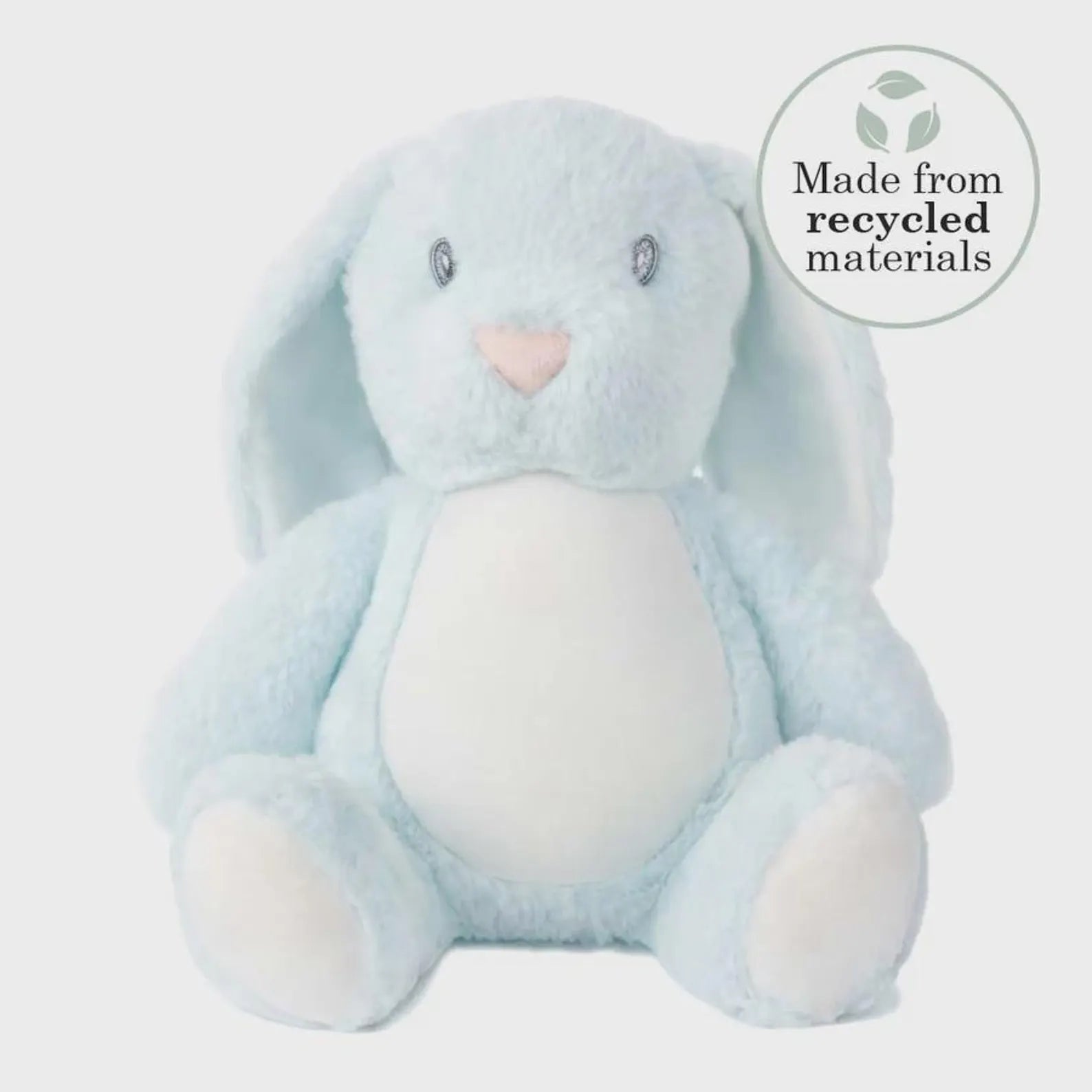 Blue plush bunny toy with a heart nose on a light gray background, featuring a 'Made from recycled materials' label.