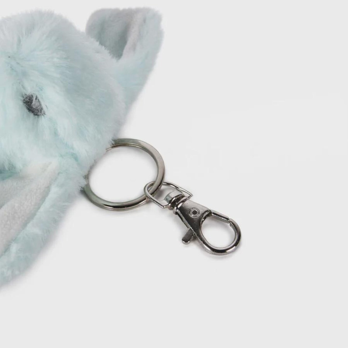 Plush keychain with a metal clasp on a white background