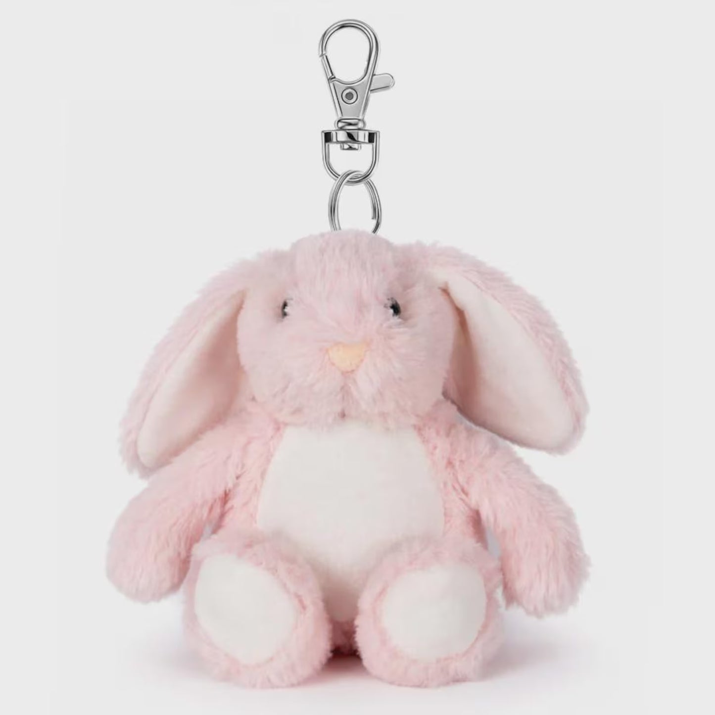 Pink plush bunny keychain on a white background