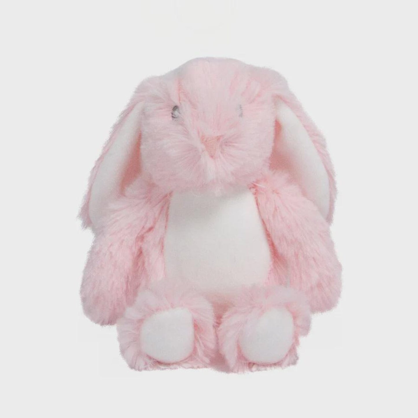 Pink plush bunny toy on a light gray background