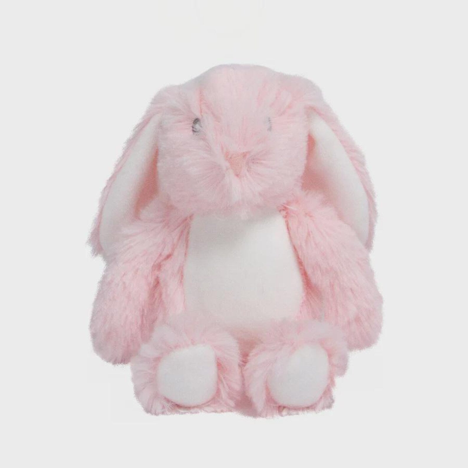 Pink plush bunny toy on a light gray background