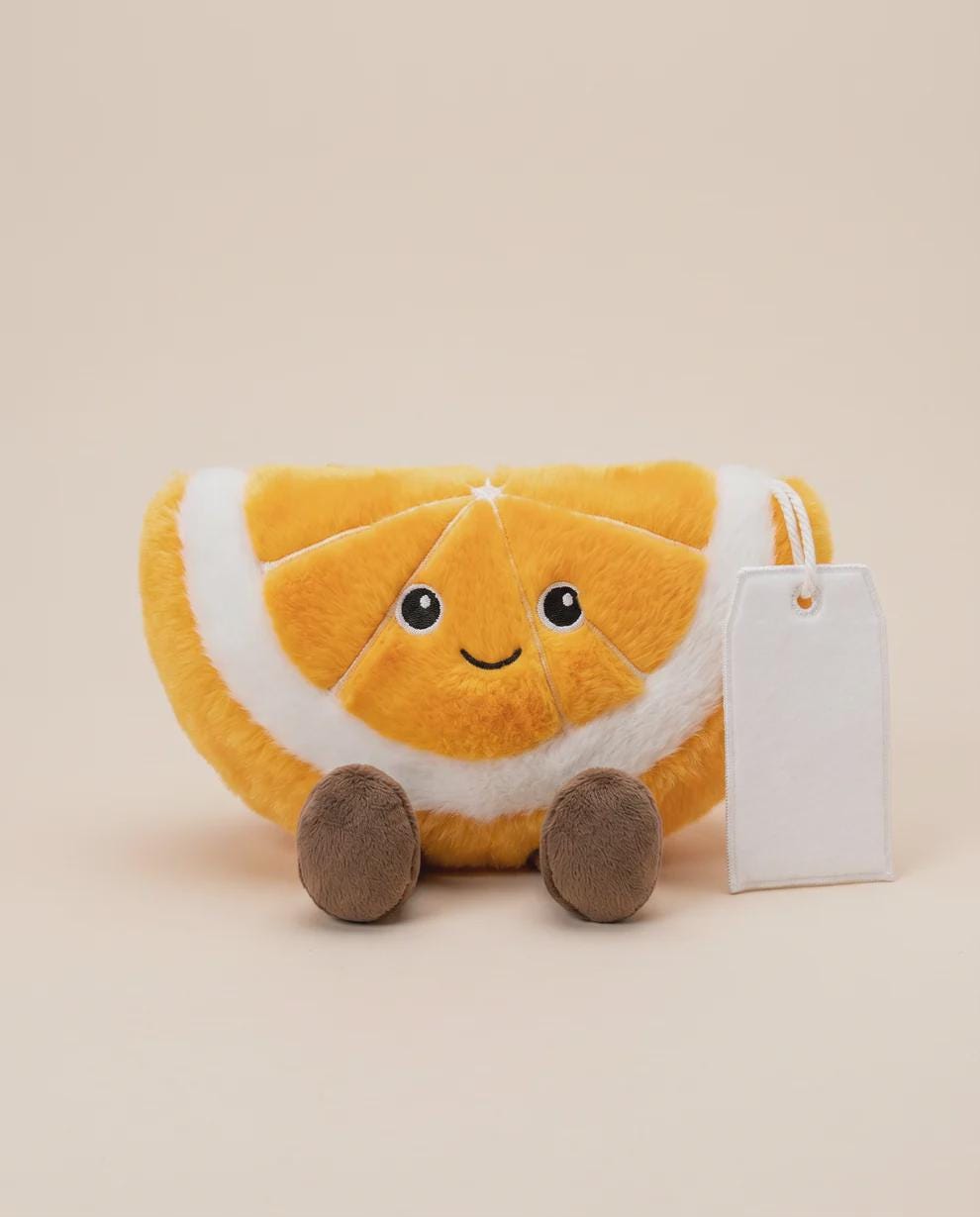 Ollie the Orange Slice plush with personalised printed tag