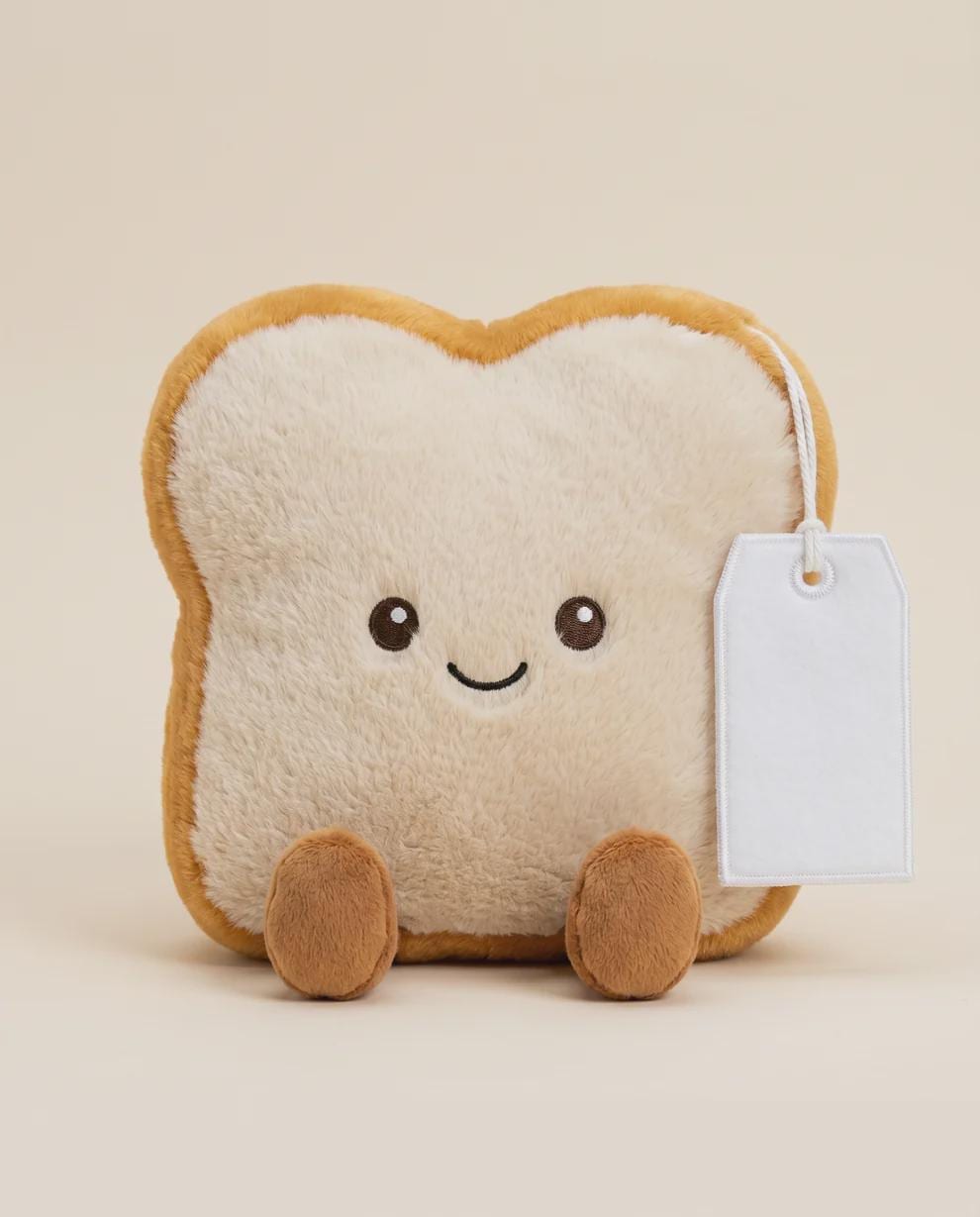 Toby the Toast plush with personalised printed tag.”